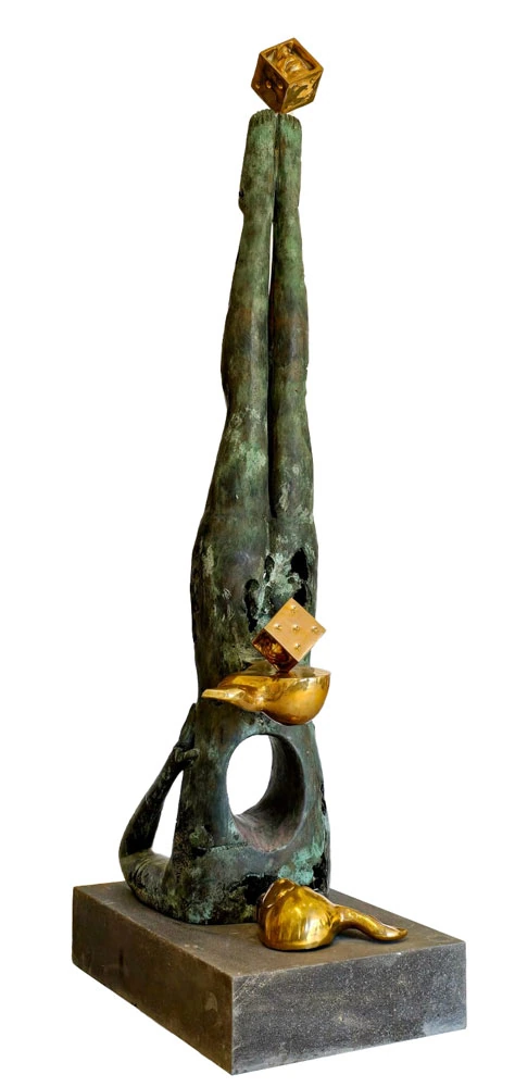 An elongated inverted form, with golden dice and masks.