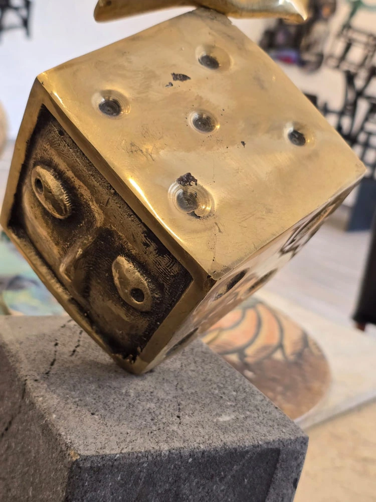 A metal die; a close view of the surface and its details.