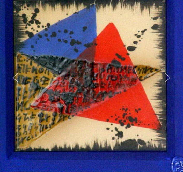 M16: overlapping red and blue triangles with black splashes and lettering inside a blue frame.