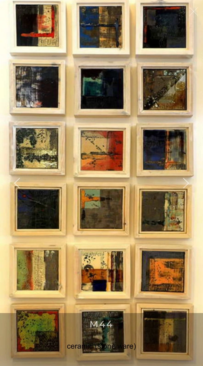 M44 · Eighteen small framed works, arranged in three columns.