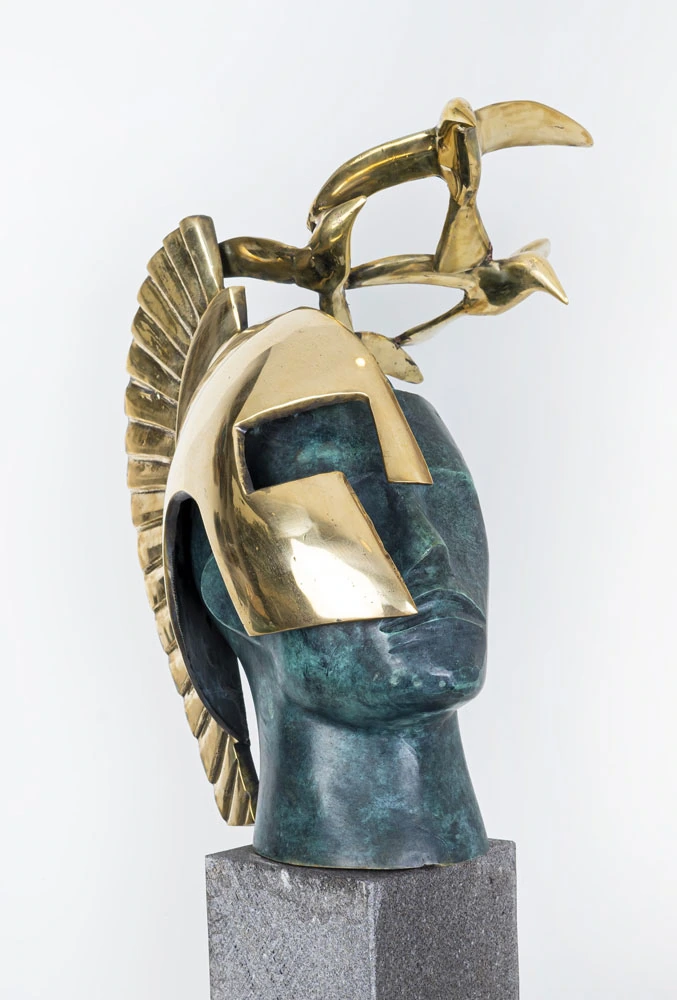 A helmeted head crowned by birds, against a pale background.