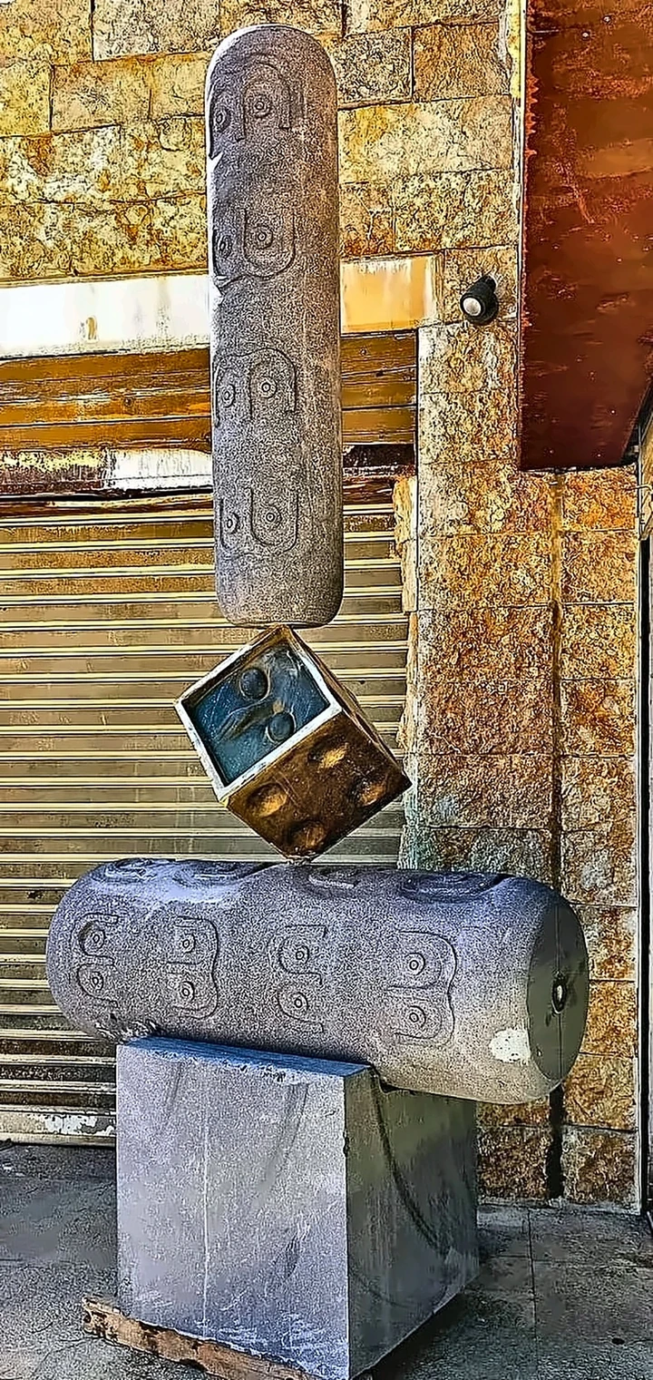 The latest basalt and bronze work photographed outside the studio.